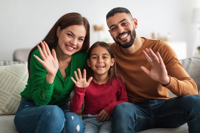 happy-arab-family-waving-hands